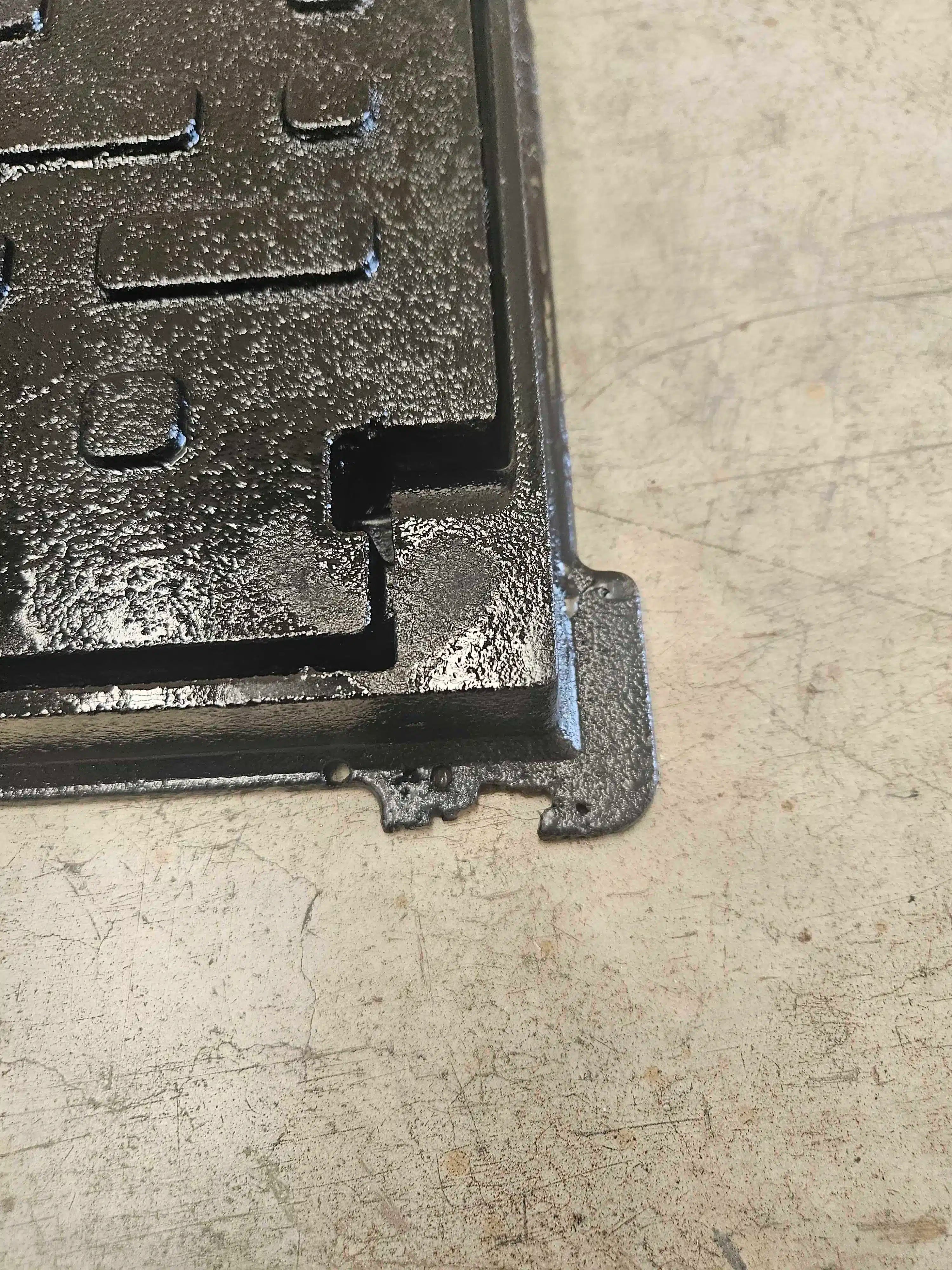 Tapa con marco de fundición dúctil 320x320 clase B125 - Producto defectuoso